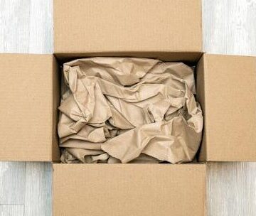 Eco-friendly void fill paper protecting products inside shipping box to prevent damage during transit